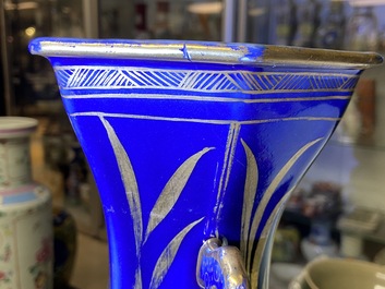 A pair of Chinese gilt-decorated monochrome blue vases, Qianlong