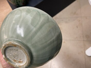 Three Chinese celadon-glazed 'lotus' bowls, Song