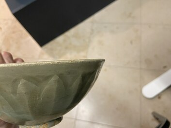 Three Chinese celadon-glazed 'lotus' bowls, Song