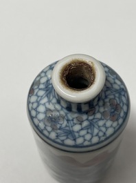 Five Chinese blue, white and copper-red snuff bottles, 18/20th C.