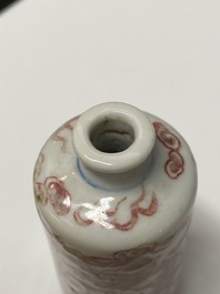 Five Chinese blue, white and copper-red snuff bottles, 18/20th C.