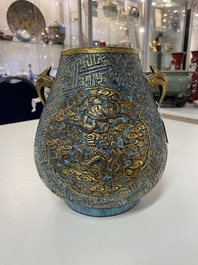 A Chinese 'robin's egg and imitation bronze'-glazed 'hu' vase, Qianlong mark, 19th C.