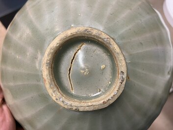 Three Chinese celadon-glazed 'lotus' bowls, Song