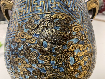 A Chinese 'robin's egg and imitation bronze'-glazed 'hu' vase, Qianlong mark, 19th C.
