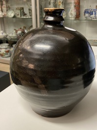 A Chinese black-brown-glazed russet-splashed jar, Henan kilns, Song