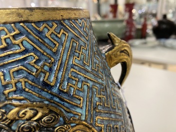 A Chinese 'robin's egg and imitation bronze'-glazed 'hu' vase, Qianlong mark, 19th C.