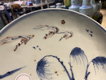A Chinese blue, white and copper red ko-sometsuke 'fish' plate for the Japanese market, Transitional period