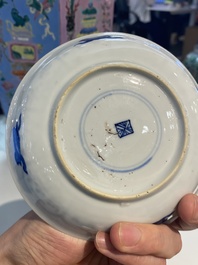 A Chinese blue and white covered cup and saucer for the French market, Kangxi
