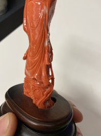 A Chinese carved red coral 'Guanyin' figure, 19/20th C.