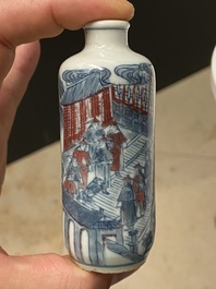 Five Chinese blue, white and copper-red snuff bottles, 18/20th C.