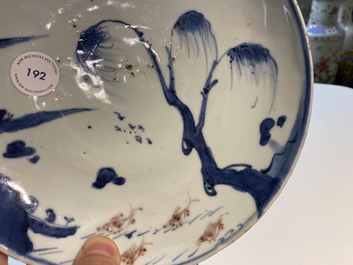A Chinese blue, white and copper red ko-sometsuke 'fish' plate for the Japanese market, Transitional period