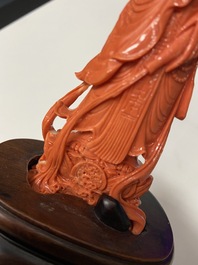 A Chinese carved red coral 'Guanyin' figure, 19/20th C.
