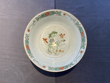 A Chinese famille verte relief-decorated bowl with squirrels and rabbits, Kangxi
