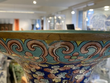 A pair of large Chinese famille rose 'dragon' vases, 19th C.