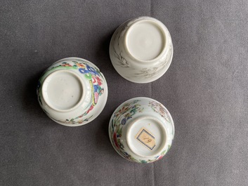 Five Chinese famille rose and grisaille saucers and three cups, Yongzheng