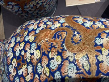 A pair of large Chinese famille rose 'dragon' vases, 19th C.
