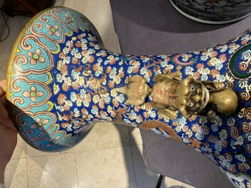 A pair of large Chinese famille rose 'dragon' vases, 19th C.