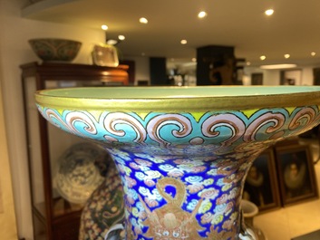 A pair of large Chinese famille rose 'dragon' vases, 19th C.