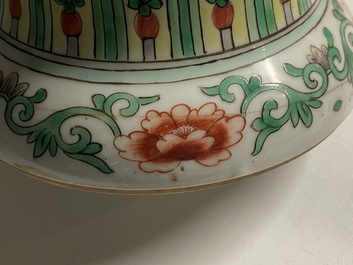 A Chinese famille verte 'mythical animals' vase and a famille rose jar and cover with dragons, 19/20th C.