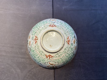 A Chinese famille verte relief-decorated bowl with squirrels and rabbits, Kangxi