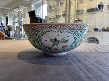 A Chinese famille verte relief-decorated bowl with squirrels and rabbits, Kangxi
