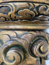 A large Chinese gilded wooden 'dragon' stand, 19th C.