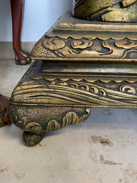 A large Chinese gilded wooden 'dragon' stand, 19th C.