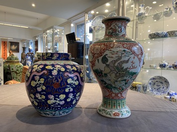 A Chinese famille verte 'mythical animals' vase and a famille rose jar and cover with dragons, 19/20th C.