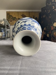 A Chinese blue and white 'yuhuchunping' 'dragon' vase on wooden stand, Qianlong mark, 19/20th C.