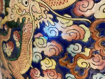 A pair of large Chinese famille rose 'dragon' vases, 19th C.