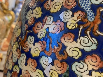 A pair of large Chinese famille rose 'dragon' vases, 19th C.
