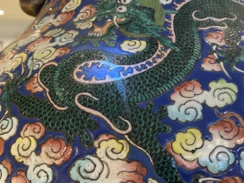 A pair of large Chinese famille rose 'dragon' vases, 19th C.