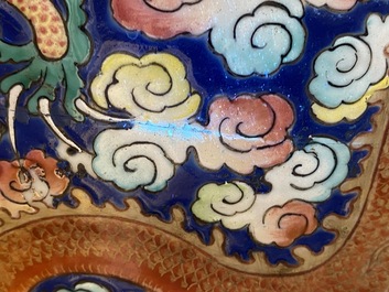 A pair of large Chinese famille rose 'dragon' vases, 19th C.