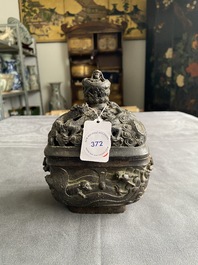 A Chinese bronze 'mythical beasts' censer and cover, 17th C.