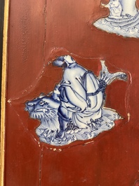 A large Chinese porcelain-embellished lacquered wooden screen, 18/19th C.