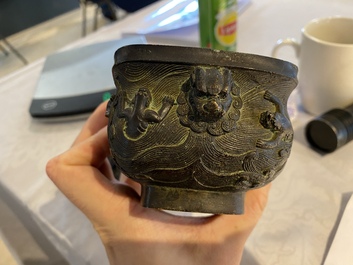 A Chinese bronze 'mythical beasts' censer and cover, 17th C.
