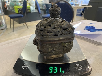 A Chinese bronze 'mythical beasts' censer and cover, 17th C.