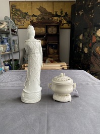 A Chinese Dehua blanc de Chine figure of Guanyin and a covered censer on stand, 18/19th C.