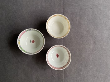 Five Chinese famille rose and grisaille saucers and three cups, Yongzheng