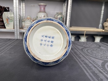 A Chinese blue and white 'yuhuchunping' 'dragon' vase on wooden stand, Qianlong mark, 19/20th C.