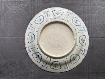 A large Chinese blue and white kraak porcelain dish with a finely painted jardini&egrave;re, Wanli