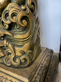 A large Chinese gilded wooden 'dragon' stand, 19th C.