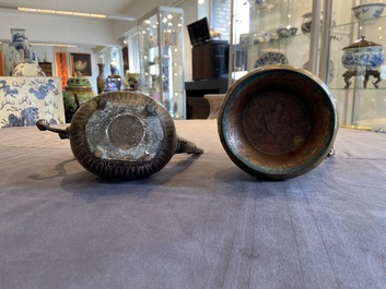 A Tibetan brass ewer, an alms bowl and an Indian bronze ewer, 18/19th C.