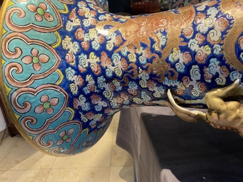 A pair of large Chinese famille rose 'dragon' vases, 19th C.