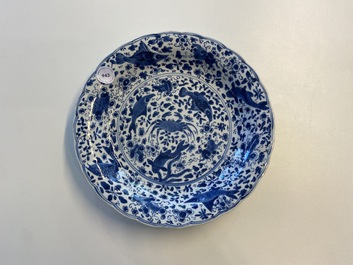 A Chinese blue and white lobed 'crab and fish' dish, Yu mark, Kangxi