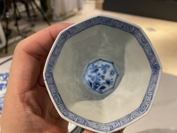 Twenty-one Chinese blue and white saucers and eighteen cups, Kangxi