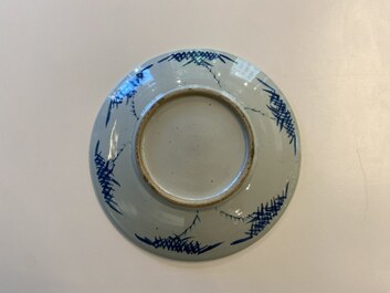 Three Chinese blue and white dishes with dragons, phoenixes and Buddhist lions, 19th C.