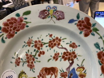 A pair of Chinese famille rose 'horse' plates, Yongzheng/Qianlong