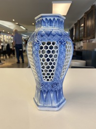 A Chinese reticulated double-walled blue and white vase, Kangxi