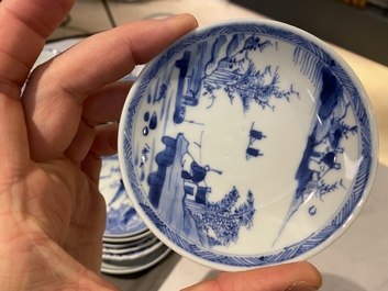Twenty-one Chinese blue and white saucers and eighteen cups, Kangxi
